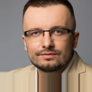 Portret doradcy Łukasz Rosikoń